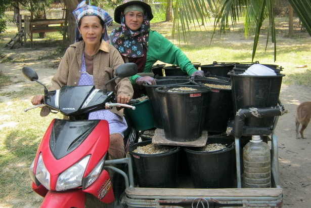 Huayong dog rescue center Warin on motorbike